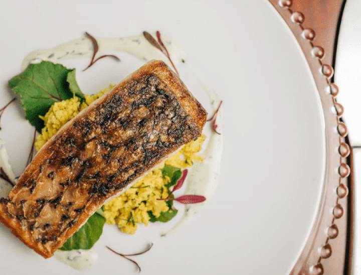Barramundi turmeric cauliflower almond dukkah red chard herb yoghurt