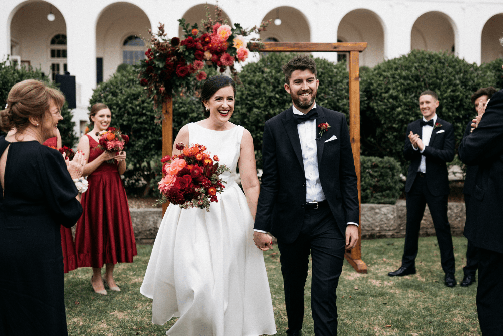 Emily and Thomas Walking Down Aisle