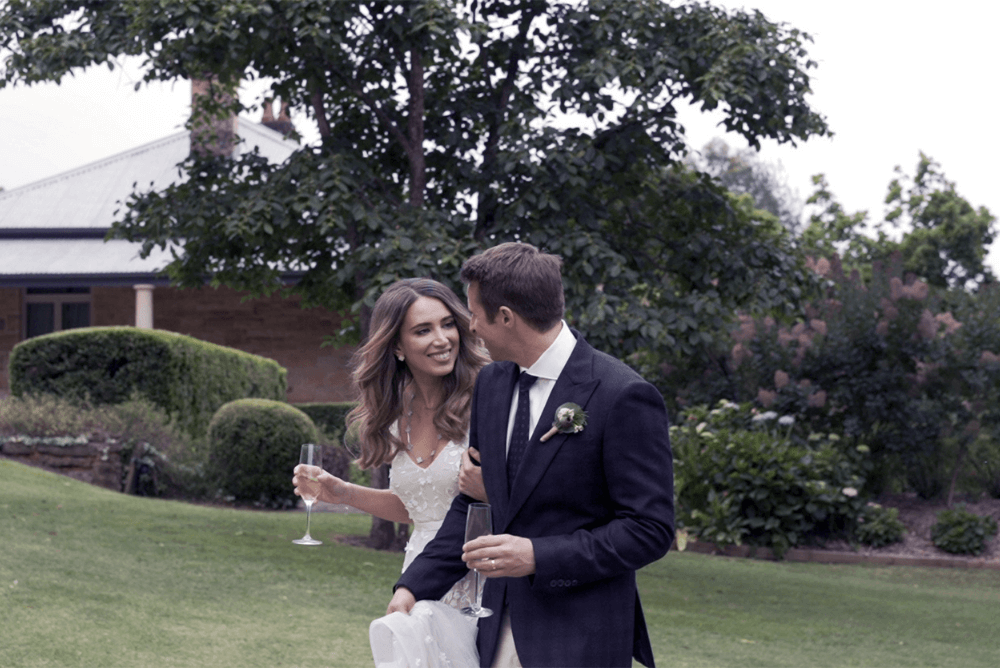 Mathew and Julia Walking Up the Lawns